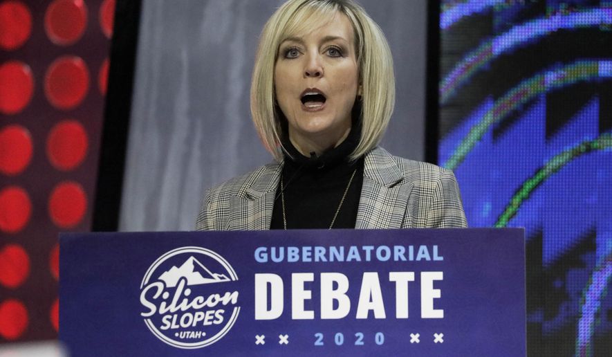 FILE - In this Jan. 31, 2020, file photo, Aimee Winder Newton, a Salt Lake County Council member, speaks during a debate for Utah's 2020 gubernatorial race, in Salt Lake City. The Utah governor's race is filling out, with another Republican candidate choosing a running mate. Salt Lake County Council member Winder Newton announced Tuesday, March 24, 2020, that her lieutenant governor pick is State Auditor John Dougall. (AP Photo/Rick Bowmer, File)