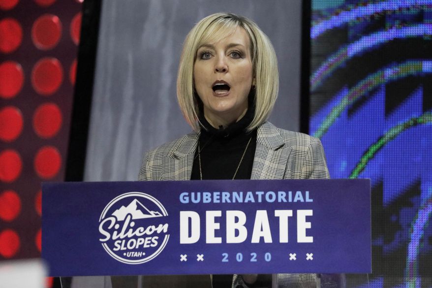 FILE - In this Jan. 31, 2020, file photo, Aimee Winder Newton, a Salt Lake County Council member, speaks during a debate for Utah's 2020 gubernatorial race, in Salt Lake City. The Utah governor's race is filling out, with another Republican candidate choosing a running mate. Salt Lake County Council member Winder Newton announced Tuesday, March 24, 2020, that her lieutenant governor pick is State Auditor John Dougall. (AP Photo/Rick Bowmer, File)