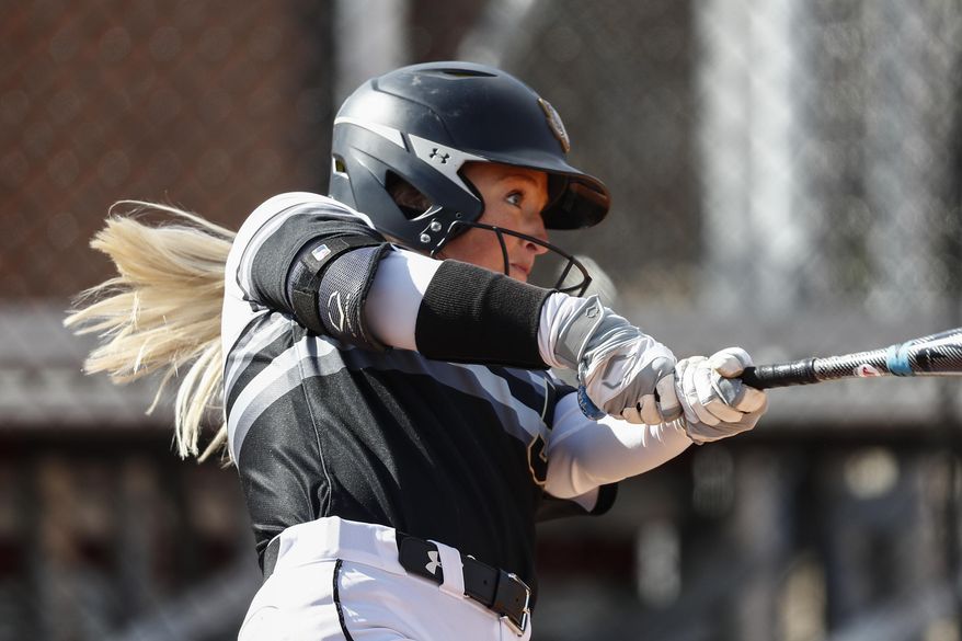 FILE - In this March 6, 2020, file photo, Purdue Fort Wayne's Rachel Everson connects for a hit during an NCAA softball game against UMass Lowell in Clarksville, Tenn. The NCAA Division I Council is scheduled Monday, March 30, 2020, to vote on providing another year of eligibility to spring sport athletes, such as baseball, softball and lacrosse players, who had their seasons wiped out by the coronavirus pandemic. (AP Photo/Wade Payne, File)