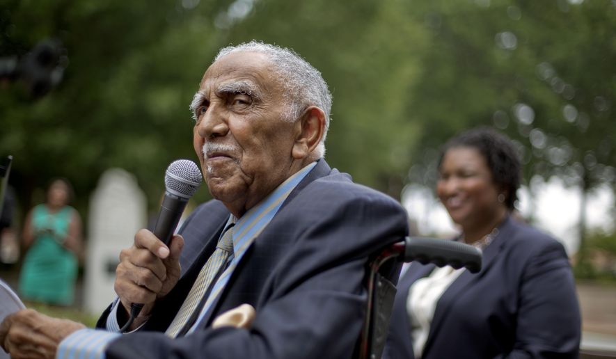 In this Aug. 14, 2013, file photo, civil rights leader the Rev. Joseph E. Lowery speaks at an event in Atlanta announcing state lawmakers from around the county have formed an alliance they say will combat restrictive voting laws, Lowery, a veteran civil rights leader who helped the Rev. Dr. Martin Luther King Jr. found the Southern Christian Leadership Conference and fought against racial discrimination, died Friday, March 27, 2020, a family statement said. He was 98. (AP Photo/David Goldman, File) **FILE**