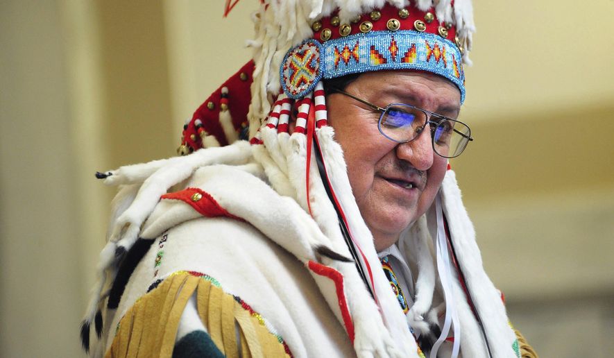 FILE - In this Thursday Feb. 3, 2011 file photo Blackfeet Nation chairman Willie Sharp talks during his State of the Tribal Nations Address at the Montana capitol in Helena, Mont. Sharp was sentenced Monday, March 30, 2020, to 10 months in prison for a scheme that stole money from a tribal early education program. (Eliza Wiley/Independent Record via AP)
