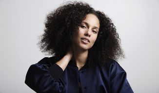 FILE - In this Nov. 2, 2016 file photo, Alicia Keys poses for a portrait in New York. Keys&#39; memoir &amp;quot;More Myself&amp;quot; with be released on Tuesday, March 31. (Photo by Taylor Jewell/Invision/AP, File)