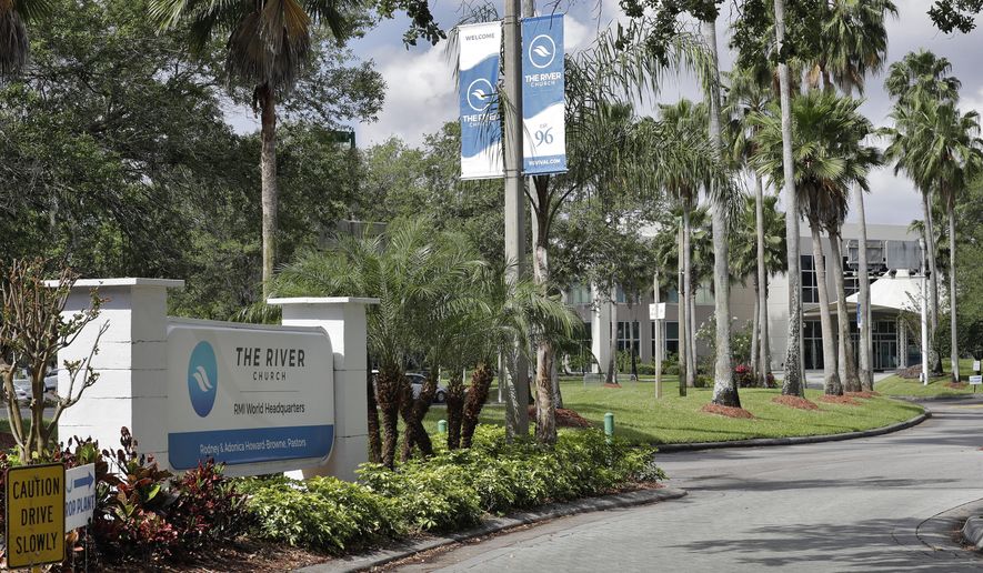 The River Church is shown Monday, March 30, 2020, in Tampa, Fla. The Hillsborough County Sheriff's Office has warned the megachurch about violating a safer-at-home order in place to limit the spread of coronavirus. The church is continuing to hold Sunday church services despite warnings for social distancing in order. (AP Photo/Chris O'Meara)