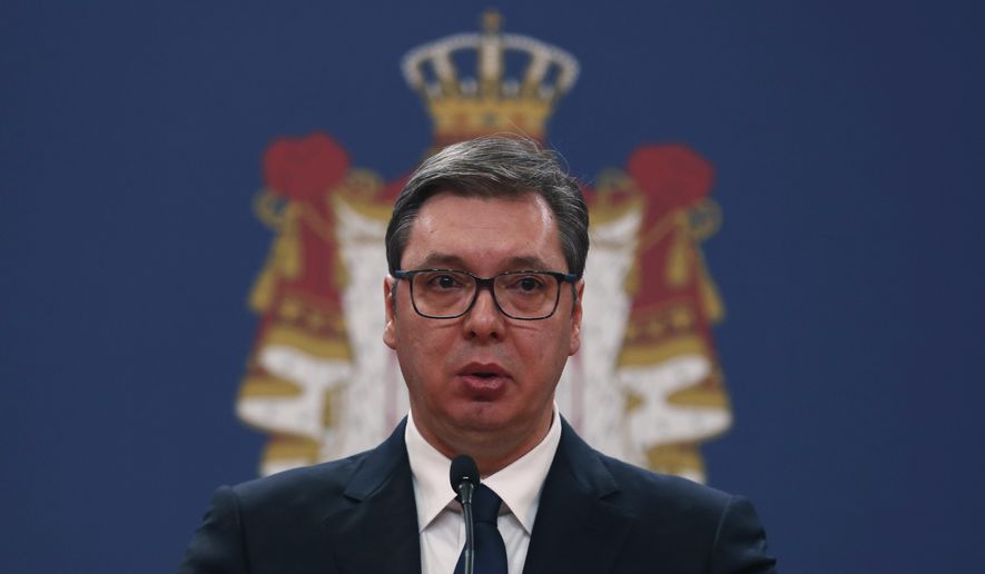 In this March 15, 2020, photo, Serbian President Aleksandar Vucic speaks during a news conference in Belgrade, Serbia. Since declaring nationwide state of emergency Vucic has suspended parliament, giving him widespread powers such as closing borders and introducing a 12-hour curfew. (AP Photo/Darko Vojinovic)