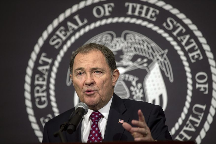 Utah Gov. Gary Herbert shares updates during a COVID-19 pandemic press conference Monday, March 30, 2020, at the Utah State Capitol, in Salt Lake City. (Scott G Winterton/Deseret News, via AP, Pool)