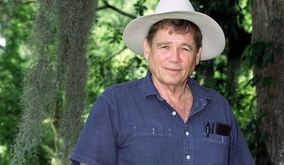 ** FILE ** Novelist James Lee Burke poses near his home in New Iberia, La., in this April 27, 2001 file photo.  Burke&#39;s new book, the 15th novel in the series featuring detective-hero Dave Robicheaux, &quot;Pegasus Descending,&quot; is being published by Simon &amp; Schuster.(AP Photo/Brad Kemp)