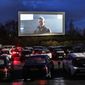 Hundreds of people sit in their cars watching a movie trailer at a drive-in cinema, as all other theaters in Germany are closed due to the coronavirus in Essen, Germany, on Monday, March 30, 2020. Only two persons are allowed per car, tickets are available only online and no snacks are sold to limit social contacts. The new coronavirus causes mild or moderate symptoms for most people, but for some, especially older adults and people with existing health problems, it can cause more severe illness or death. (AP Photo/Martin Meissner)
