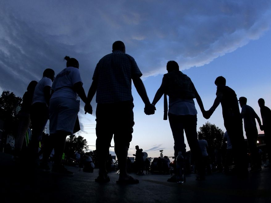Major pollster reveals that the majority of Americans are now praying for an end to the coronavirus pandemic. (AP Photo) ** FILE **