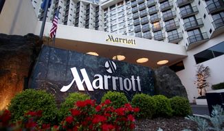 FILE - This April 20, 2011 file photo shows Portland Marriott Downtown Waterfront in Portland, Ore.  Marriott says guests’ names, loyalty account information and other personal details may have been accessed in the second major data breach to hit the company in less than two years. The world&#39;s largest hotel company says on Tuesday, March 31, 2020, approximately 5.2 million guests may have been affected.  (AP Photo/Rick Bowmer, File)