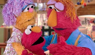 This undated image provided by Sesame Workshop shows Elmo and his parents Louie and Mae. Sesame Workshop announced Monday, March 30, 2020, that Elmo, Rooster and Cookie Monster are featured in some of four new animated public service spots reminding young fans to take care while doing such things as washing hands and sneezing. The content, which will be translated into 19 languages, is part of Sesame Workshop&#x27;s Caring for Each Other initiative to help families stay physically and mentally healthy during the coronavirus pandemic. (Sesame Workshop via AP)