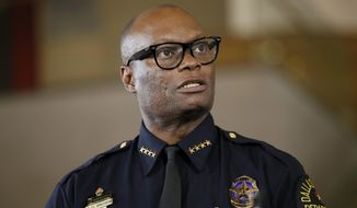 FILE - In this June 15, 2015, file photo, Dallas Police Chief David Brown briefs the media about a shooting at Dallas Police headquarters in Dallas. Chicago Mayor Lori Lightfoot on Thursday, April 2, 2020, named Brown to lead the police force in the nation&#39;s third largest city. (AP Photo/Tony Gutierrez, File)