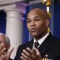 U.S. Surgeon General Jerome Adams speaks about the coronavirus in the James Brady Press Briefing Room of the White House, Friday, April 3, 2020, in Washington. (AP Photo/Alex Brandon)