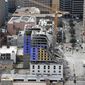 FILE - This Saturday, Oct. 12, 2019 file photo shows the Hard Rock Hotel, which was under construction, after a fatal partial collapse in New Orleans.  A federal agency has issued citations against a dozen companies in connection with last fall&#39;s deadly partial collapse of a hotel under construction in New Orleans, Friday, April 3, 2020. (AP Photo/Gerald Herbert, File)