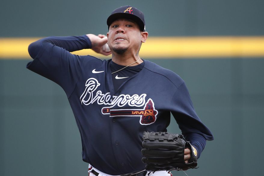 Atlanta Braves starting pitcher Felix Hernandez warms up for a spring training baseball game against the Tampa Bay Rays, Tuesday, March 3, 2020, in Venice, Fla. (AP Photo/Elise Amendola)