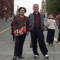 This May 13, 2019 photo provided by Liu Dong’e shows her and her husband, Wu Chuanyong, while visiting Moscow. Wu Chuanyong had been enjoying a peaceful retirement in the central Chinese city of Wuhan. The 68-year-old family patriarch began each morning with a stroll through the park and ended the day watching television dramas. Then the coronavirus hit, quickly spreading in Wuhan and around the world. (Courtesy Liu Dong’e via AP)