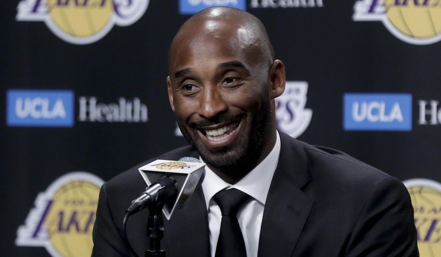 FILE - In this Dc. 18, 2017 file photo, former Los Angeles Laker Kobe Bryant talks during a news conference in Los Angeles.  Bryant and fellow NBA greats Tim Duncan and Kevin Garnett headlined a nine-person group announced Saturday, April 4, 2020,  as this year’s class of enshrinees into the Naismith Memorial Basketball Hall of Fame. They all got into the Hall in their first year of eligibility, as did WNBA great Tamika Catchings. Two-time NBA champion coach Rudy Tomjanovich, longtime Baylor women’s coach Kim Mulkey, 1,000-game winner Barbara Stevens of Bentley and three-time Final Four coach Eddie Sutton were selected. So was former FIBA Secretary General Patrick Baumann. (AP Photo/Chris Carlson, File)