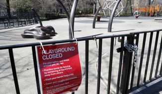 Vanderbilt playground in Brooklyn&#x27;s Prospect Park is closed on Thursday, April 2, 2020, in New York. On Wednesday, New York Gov. Andrew Cuomo ordered all of New York city&#x27;s playgrounds shut to slow the spread of the coronavirus. The governor followed calls from public-health experts and many City Council members to shut the playgrounds as families gathered there. But the closures presented a new challenge for families weathering a lockdown that also closed schools. (AP Photo/Kathy Willens) **FILE**