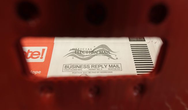 A box of ballots mailed in for the Washington state primary election are shown at the King County Elections headquarters in Renton, Wash. (AP Photo/Ted S. Warren, File)