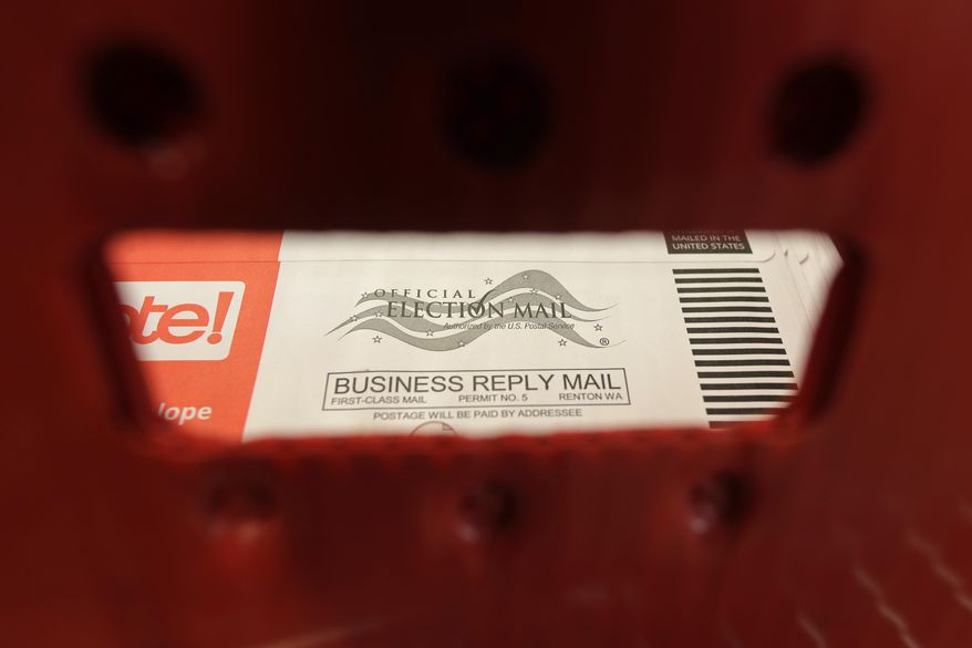 A box of ballots mailed in for the Washington state primary election are shown at the King County Elections headquarters in Renton, Wash. (AP Photo/Ted S. Warren, File)