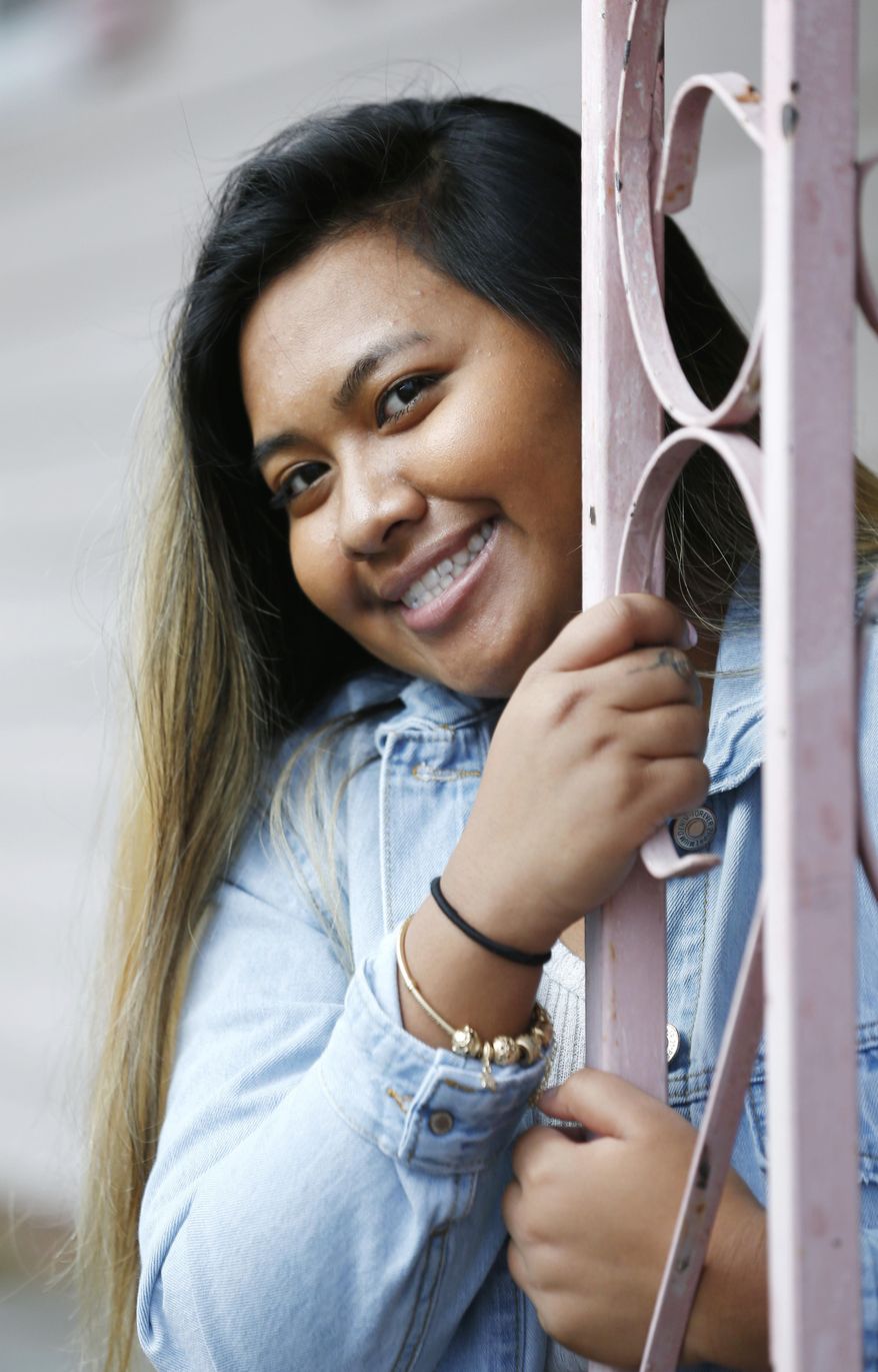 In this Wednesday, Feb. 5, 2020, photo, Elizabeth Rahlan-Ksor poses for a portrait at her home in Greensboro, N.C. (Woody Marshall/News & Record via AP)