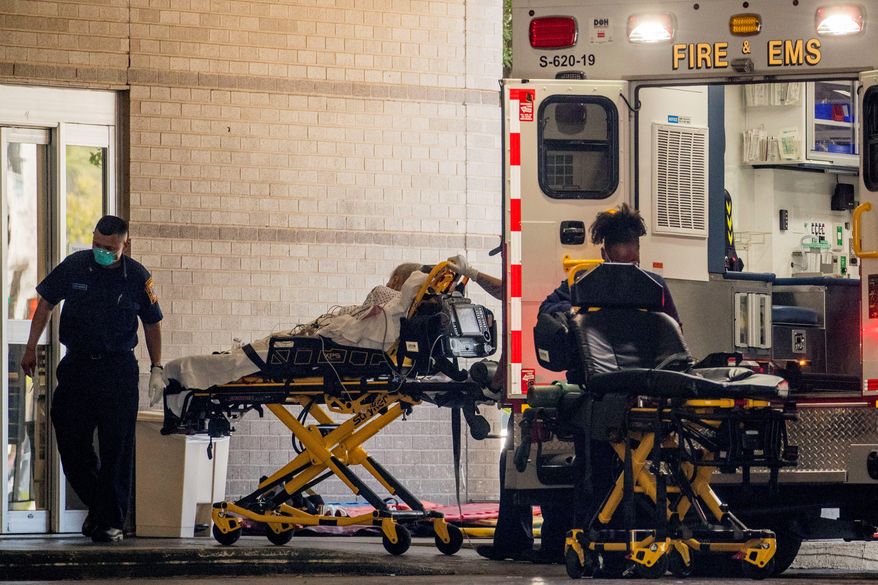 The coronavirus is most lethal among the old and sick, and public health scholars say mortality rates appear to mirror the seasonal flu. (Associated Press)