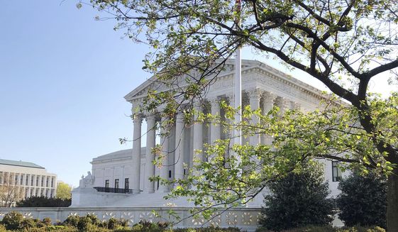 The Supreme Court is shown, Monday, April 6, 2020, in Washington. (AP Photo/Mark Sherman) ** FILE **