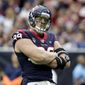FILE - In this Oct. 27, 2019, file photo, Houston Texans defensive end J.J. Watt (99) reacts after a play against the Oakland Raiders during the first half of an NFL football game, in Houston. Next Monday, the Hall of Fame and the NFL will announce the roster for the 2010-19 All-Decade team.(AP Photo/Michael Wyke, File)
