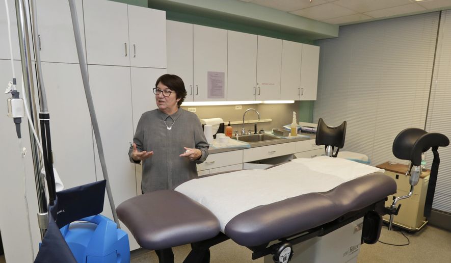 This Feb. 25, 2020, shows Preterm executive director Chrisse France in the procedure room in Cleveland. Court decisions in two U.S. states Monday, April 6, allowed abortions to continue after the procedure was caught in the crosshairs of governors’ orders suspending non-essential elective surgeries due to the new coronavirus. (AP Photo/Tony Dejak)