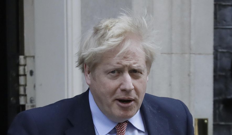 In this Wednesday, March 25, 2020, file photo Britain&#39;s Prime Minister Boris Johnson leaves 10 Downing Street for the House of Commons for his weekly Prime Ministers Questions, in London. Johnson has been moved to the intensive care unit of a London hospital on Monday, April 6, 2020, after his coronavirus symptoms worsened. Johnson’s office says Johnson is conscious and does not require ventilation at the moment. Johnson was admitted to St. Thomas’ Hospital late Sunday, 10 days after he was diagnosed with COVID-19. (AP Photo/Matt Dunham, File)
