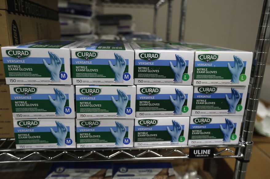 Medical supplies are seen at the TCF Center, Monday, April 6, 2020, in Detroit. The White House said Monday, April 6, that some states are requesting far more medical supplies than they need to fight the coronavirus pandemic, pushing back against criticism that the distribution of vital equipment has been chaotic. (AP Photo/Carlos Osorio)