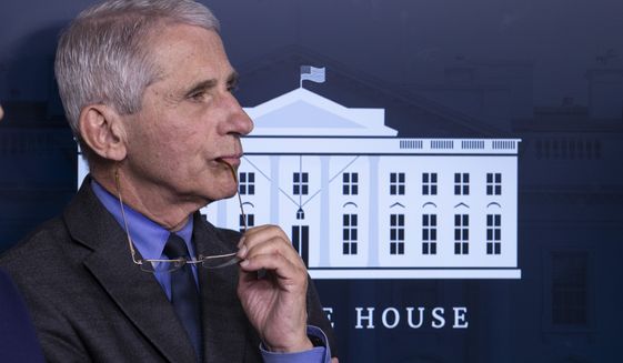 Dr. Anthony Fauci, director of the National Institute of Allergy and Infectious Diseases, listens during a briefing about the coronavirus in the James Brady Press Briefing Room of the White House, Tuesday, April 7, 2020, in Washington. (AP Photo/Alex Brandon)