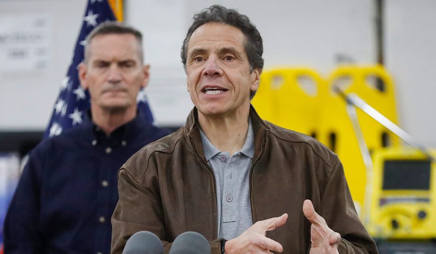 In this file photo, New York Gov. Andrew Cuomo speaks during a news conference at the Jacob Javits Center on , Monday, March 23, 2020, in New York. (AP Photo/John Minchillo) ** FILE **