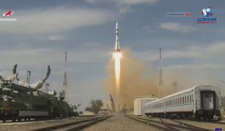 In this grab taken from video footage released by Roscosmos Space Agency,  the Soyuz-2.1a rocket booster with Soyuz MS-16 space ship carrying a new crew to the International Space Station, ISS, blasts off at the Russian leased Baikonur cosmodrome, Kazakhstan, Thursday, April 9, 2020. The Russian rocket carries U.S. astronaut Chris Cassidy, Russian cosmonauts Anatoly Ivanishin and Ivan Vagner. (Roscosmos Space Agency via AP)