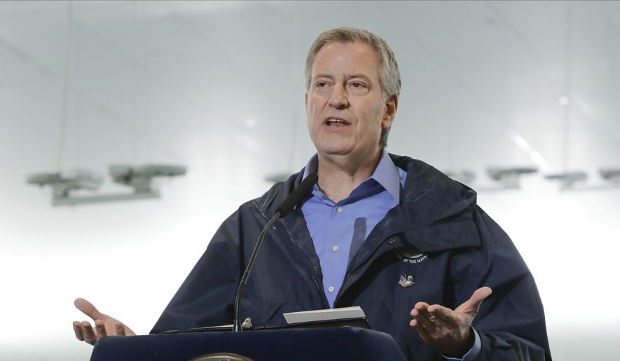 New York City Mayor Bill de Blasio speaks at the USTA Indoor Training Center where a 350-bed temporary hospital will be built in New York, March 31, 2020. (AP Photo/Frank Franklin II, File) ** FILE **