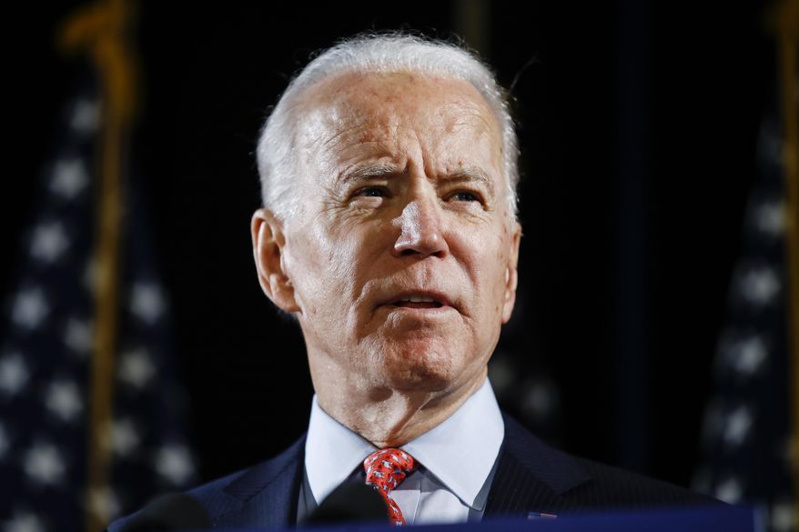 FILE - In this March 12, 2020, file photo, Democratic presidential candidate former Vice President Joe Biden speaks in Wilmington, Del. Biden has won the Alaska Democrats' party-run presidential primary, defeating Sen. Bernie Sanders on Saturday, April 11, days after Sanders suspended his campaign. (AP Photo/Matt Rourke, File)