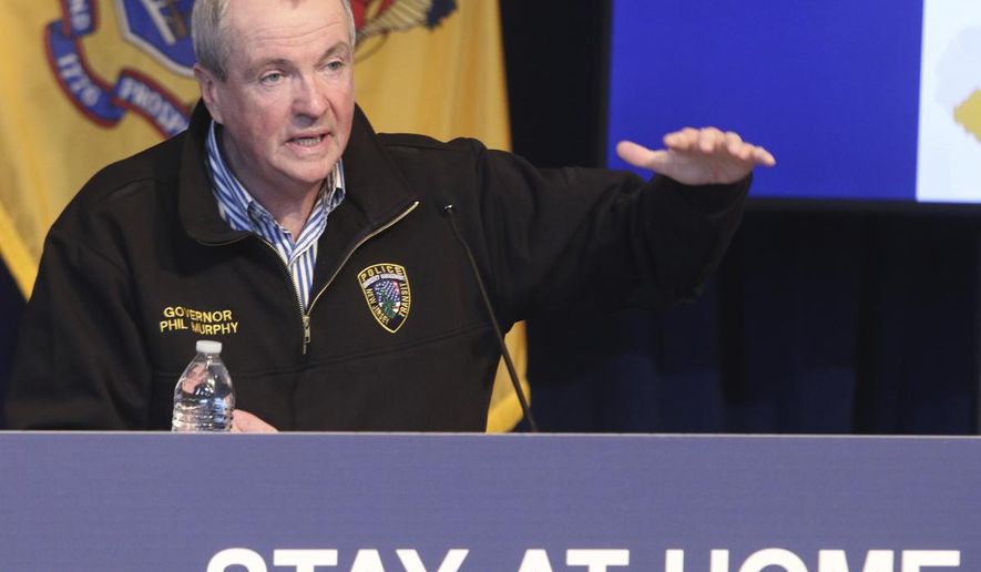 New Jersey Gov. Phil Murphy holds a news conference regarding the COVID-19 cases at the War Memorial in Trenton, N.J. on Saturday, April 11, 2020. Murphy says he is ordering state transit systems to reduce their capacity by half and will require all transit riders to wear face coverings. (Chris Pedota/The Record via AP, Pool)