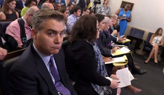 Jim Acosta of CNN listens during the daily briefing at the White House in Washington, Wednesday, Aug. 2, 2017. (Associated Press) **FILE**