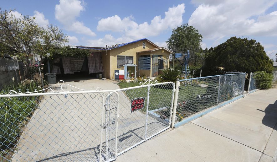 CORRECTS CITY TO LAMONT, INSTEAD OF BAKERSFIELD AND CLARIFIES ONLY THE WOMAN WAS SHOT HERE This Monday, April 13, 2020, photo shows the scene of a deadly shooting that left a pregnant woman dead in Lamont, Calif. A baby was delivered from the woman who was seven-months-pregnant and was fatally wounded during a series of violent incidents Easter night that ended with the death of the suspect during a confrontation with a SWAT team, authorities and relatives said. (Alex Horvath/The Bakersfield Californian via AP)