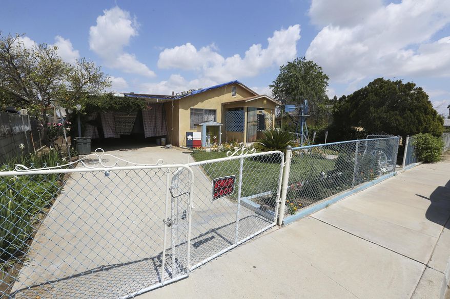 CORRECTS CITY TO LAMONT, INSTEAD OF BAKERSFIELD AND CLARIFIES ONLY THE WOMAN WAS SHOT HERE This Monday, April 13, 2020, photo shows the scene of a deadly shooting that left a pregnant woman dead in Lamont, Calif. A baby was delivered from the woman who was seven-months-pregnant and was fatally wounded during a series of violent incidents Easter night that ended with the death of the suspect during a confrontation with a SWAT team, authorities and relatives said. (Alex Horvath/The Bakersfield Californian via AP)