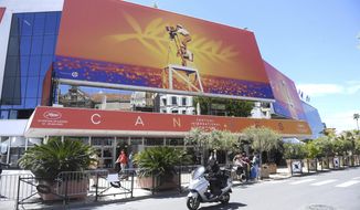 FILE - This May 13, 2019 file photo shows a view of the Palais des festivals during the 72nd international film festival, Cannes, southern France. The Cannes Film Festival on Tuesday, April 14, 2020, abandoned plans for a postponed 2020 edition in June or July but declined to give up entirely, saying it will explore other options.  (Photo by Arthur Mola/Invision/AP, File)