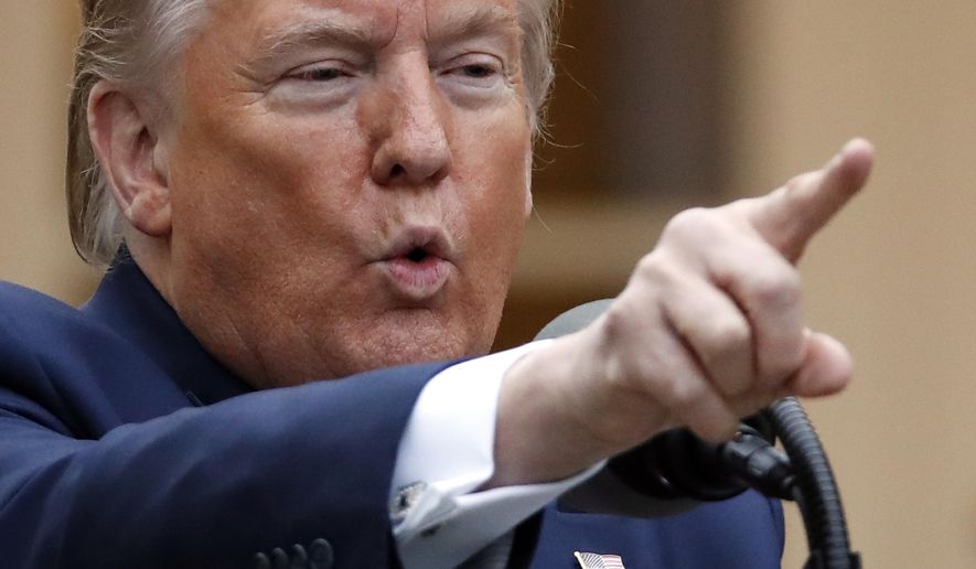 President Donald Trump speaks about the coronavirus in the Rose Garden of the White House, Tuesday, April 14, 2020, in Washington. (AP Photo/Alex Brandon)