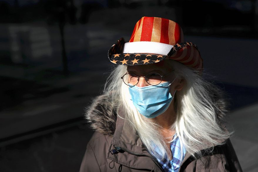 Katherine Griffin, a District of Columbia, resident, remains under a stay-home order for all residents in an effort to slow the COVID-19 spread. (Associated Press)