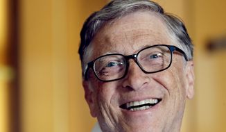Bill Gates smiles while being interviewed in Kirkland, Wash. (AP Photo/Elaine Thompson) **FILE**