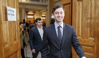 Jon Ossoff arrives to sign papers to qualify to run in the Senate race against Republican Sen. David Perdue on Wednesday, March 4, 2020, in Atlanta. Perdue s running for reelection to a second term.  (Bob Andres/Atlanta Journal-Constitution via AP) ** FILE **