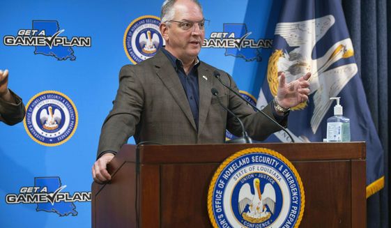 Louisiana Gov. John Bel Edwards speaks at a briefing on the state&#x27;s current situation dealing with the novel coronavirus COVID-19 public health threat, Tuesday, April 14, 2020 at the Governor&#x27;s Office of Homeland Security &amp;amp; Emergency Management in Baton Rouge, La. (Travis Spradling/The Advocate via AP, Pool) **FILE**