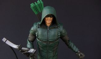 McFarlane Toys debuts its action-figure version of actor Stephen Amell as Arrow in its DC Multiverse collection. (Figure photograph by Joseph Szadkowski / The Washington Times)