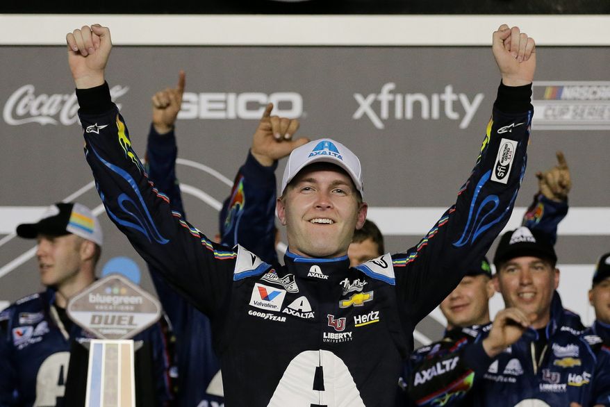 In this Feb. 13, 2020, file photo, William Byron celebrates after winning the second of the two NASCAR Daytona 500 qualifying auto races at Daytona International Speedway in Daytona Beach, Fla. Byron won his second consecutive NASCAR virtual race Sunday, April 19, 2020, by holding off Timmy Hill — the driver who moved him out of the way to win an earlier iRacing event — in a race finally low on dramatics. (AP Photo/Terry Renna, File)  **FILE**



