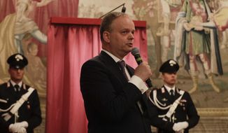 FILE - In this July 19, 2019 file photo, director of the Uffizi Gallery Eike Schmidt speaks during the unveiling ceremony of the &amp;quot;Vase of Flowers&amp;quot; painting by Jan van Huysum, at the Pitti Palace, part of the Uffizi Galleries, in Florence, Italy. On Monday, April 20, 2020, Italy was completing its sixth week of nationwide lockdown with at least two more weeks to go, as part of government efforts to contain the spread of COVID-19. Schmidt expects a boom in visitors after pandemic restrictions end, judging by the experience after previous emergencies closed down one of the world’s most popular museums.   (AP Photo/Gregorio Borgia, file)