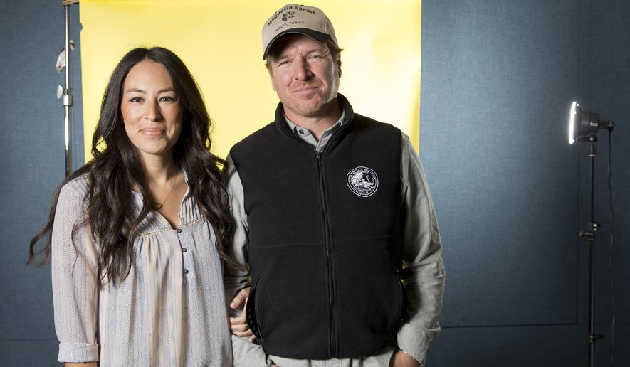 FILE - In this March 29, 2016 file photo, Joanna Gaines, left, and Chip Gaines pose for a portrait in New York to promote their home improvement show, "Fixer Upper," on HGTV. The Gaines' Magnolia Network will be blooming late because of the coronavirus crisis. The network's planned October launch is being pushed back because of production delays related to COVID-19 disease, it was announced Tuesday. Discovery Inc.'s DIY Network will be rebranded as the Magnolia Network when the joint venture with the Gaines launches. A new date wasn't immediately announced. (Photo by Brian Ach/Invision/AP, File)