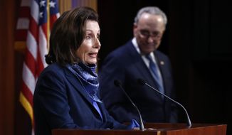 House Speaker Nancy Pelosi of Calif., speaks with reporters alongside Senate Minority Leader Sen. Chuck Schumer of N.Y. after the Senate approved a nearly $500 billion coronavirus aid bill, Tuesday, April 21, 2020, on Capitol Hill in Washington. (AP Photo/Patrick Semansky) **FILE**